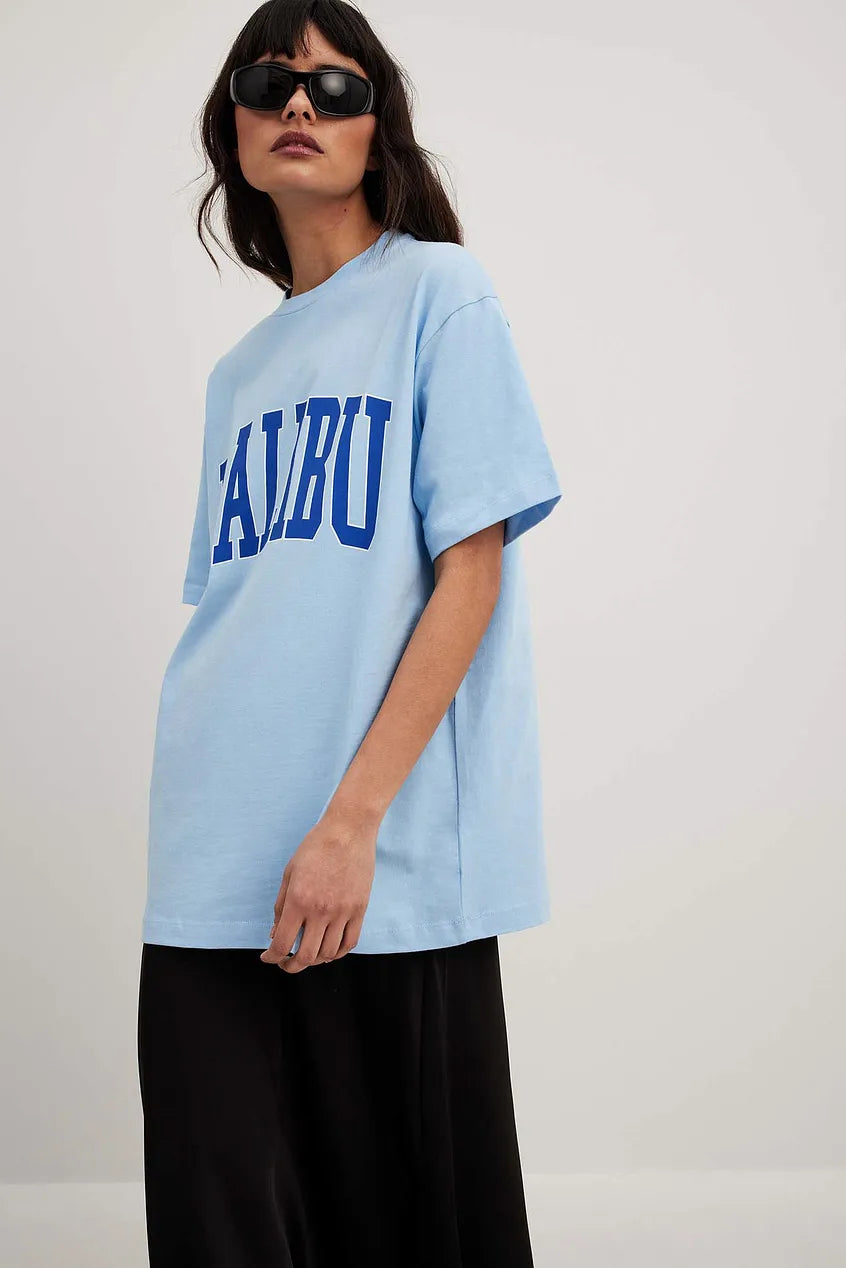 THE OVERSIZED CITY PRINT TSHIRT - MALIBU - EXCLUSIVE Tops from NA-KD - Just $33! SHOP NOW AT IAMINHATELOVE BOTH IN STORE FOR CYPRUS AND ONLINE WORLDWIDE