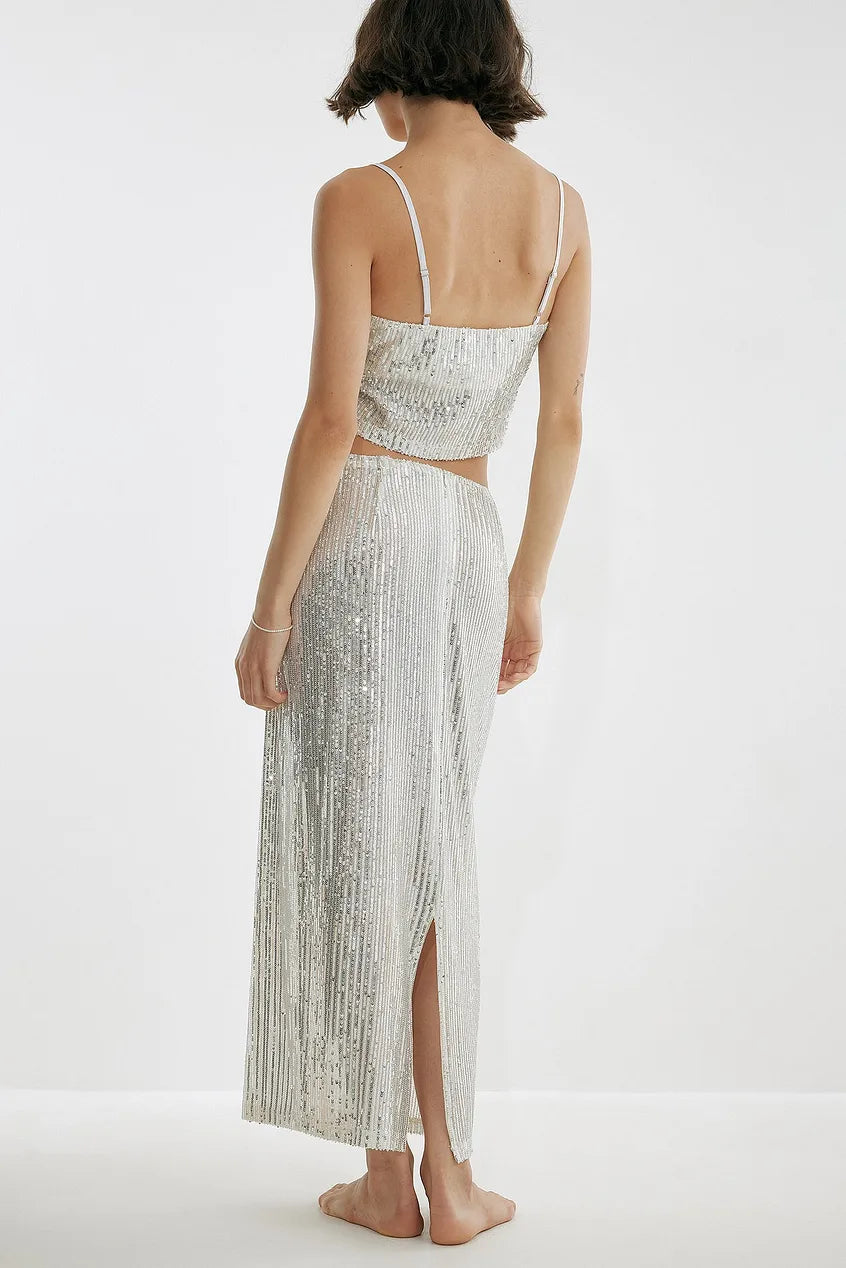 LONG SLIT SILVER SEQUIN SKIRT - EXCLUSIVE Skirts from NA-KD - Just $55.20! SHOP NOW AT IAMINHATELOVE BOTH IN STORE FOR CYPRUS AND ONLINE WORLDWIDE