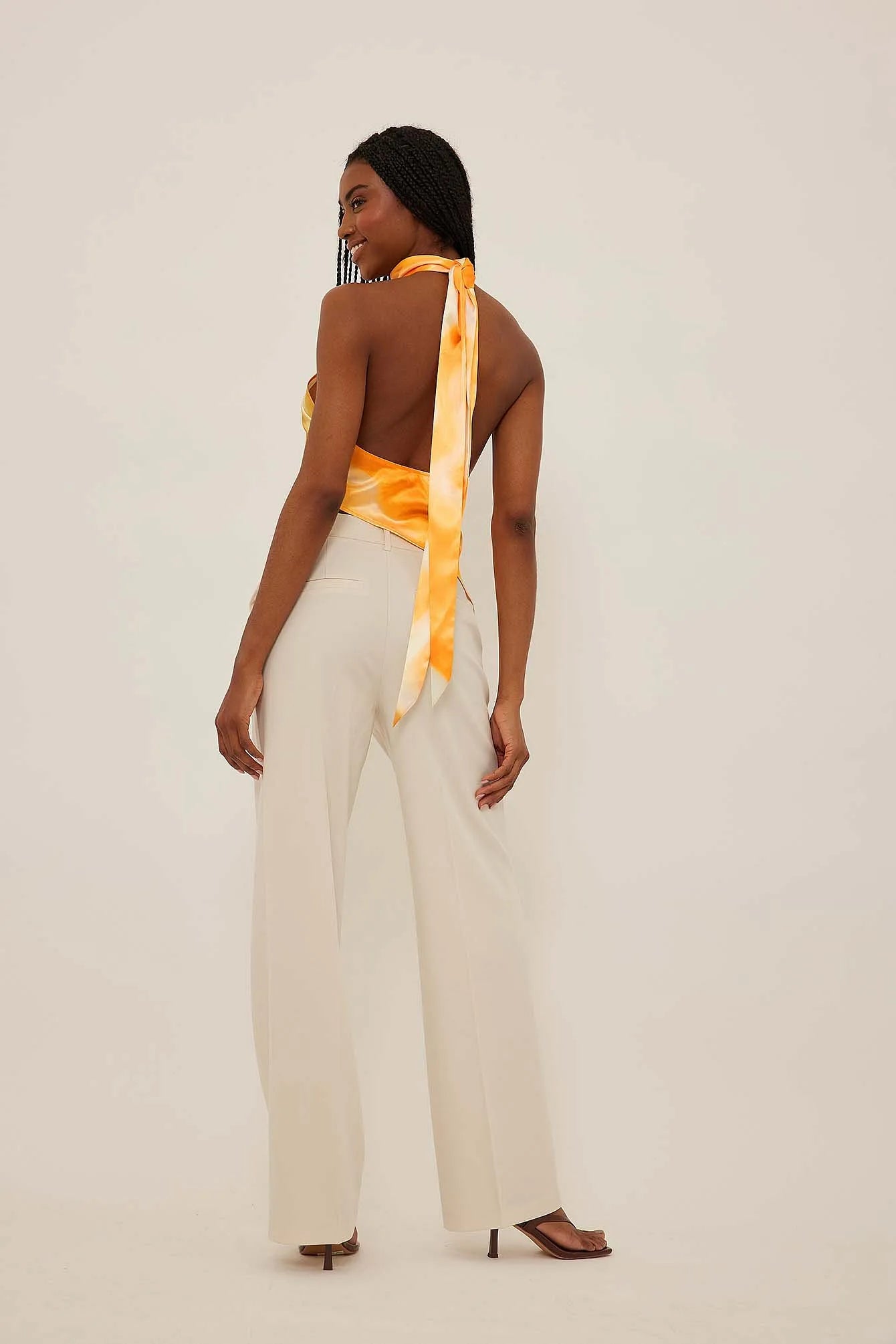 ASYMETRIC HALTER NECK SATIN TOP - SUNSET YELLOW  - VIA NA-KD | Only €44 | NOW AVAILABLE TO SHOP at IAMINHATELOVE