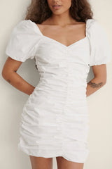 THE GATHERED RUSHED MINI ORGANIC COTTON DRESS - WHITE - EXCLUSIVE Dresses from NA-KD - Just $49.00! SHOP NOW AT IAMINHATELOVE BOTH IN STORE FOR CYPRUS AND ONLINE WORLDWIDE