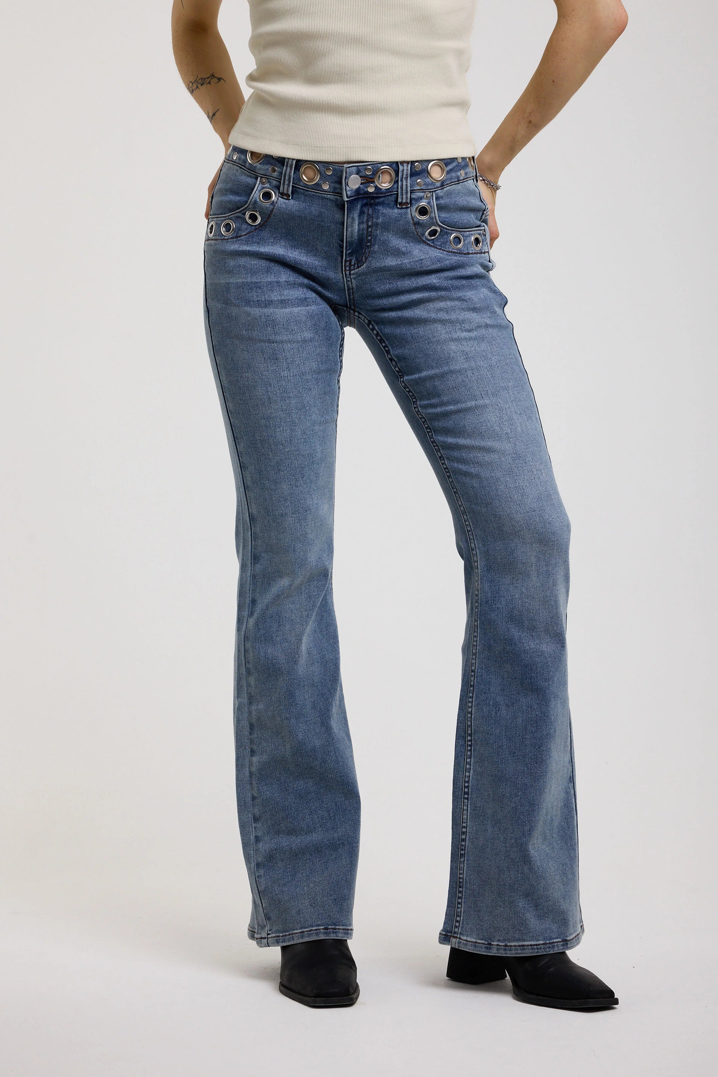 THE GRADE MID BLUE LOW RISE EYELET FLARE JEANS IN CLASSIC DENIM  - VIA THE RAGGED PRIEST | Only €99 | NOW AVAILABLE TO SHOP at IAMINHATELOVE 
