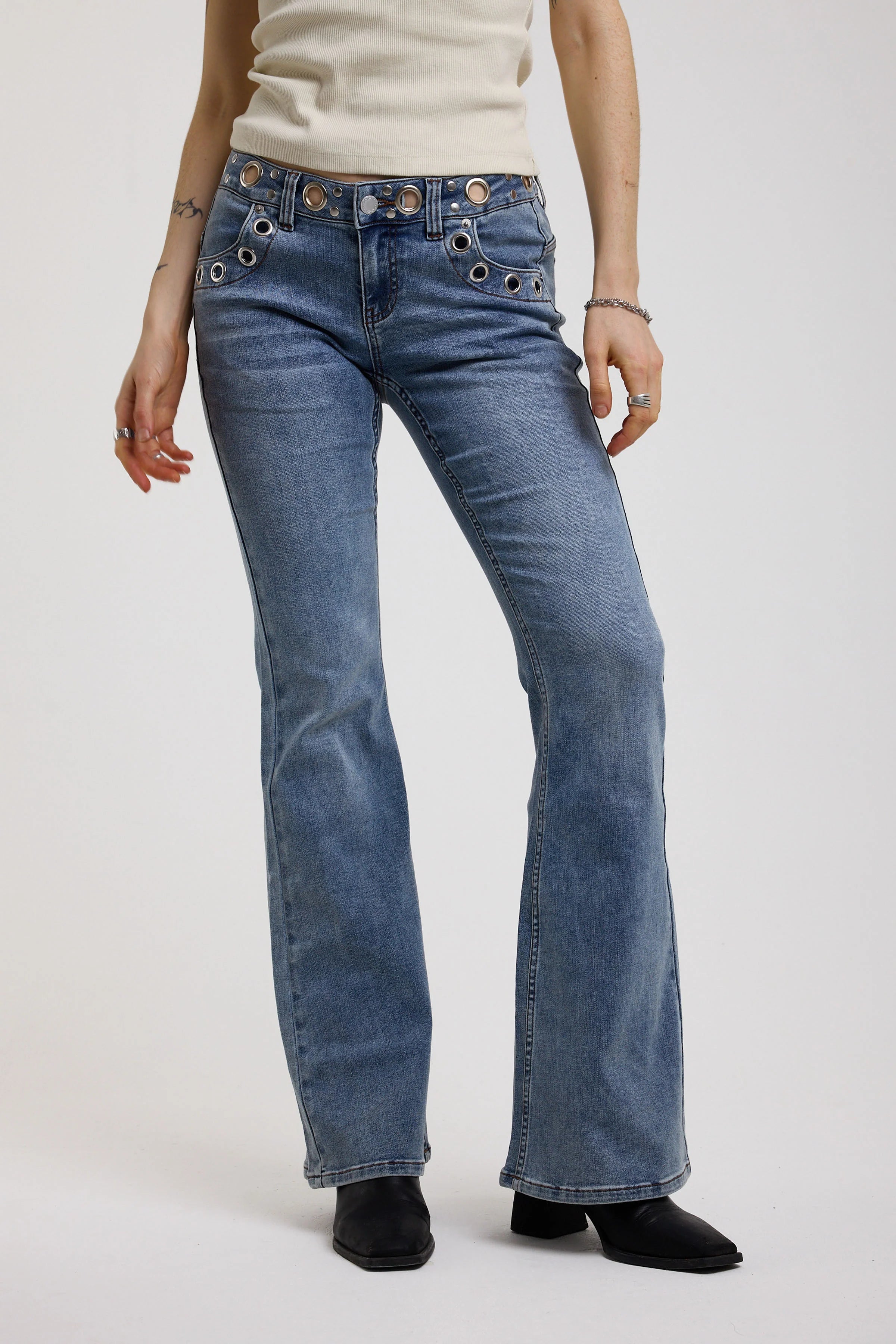 THE GRADE MID BLUE LOW RISE EYELET FLARE JEANS IN CLASSIC DENIM  - VIA THE RAGGED PRIEST | Only €99 | NOW AVAILABLE TO SHOP at IAMINHATELOVE 